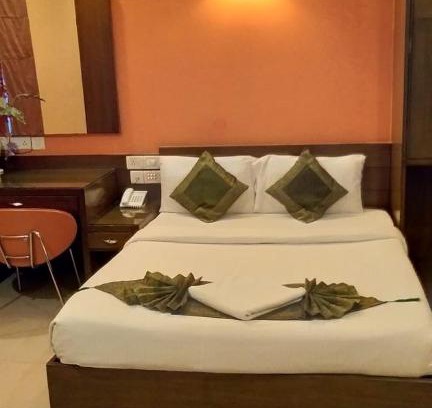 Shivaji Nagar Hotel | Cubbon Suites - 10 Minute walk to MG Road, MG Road Metro and Church Street