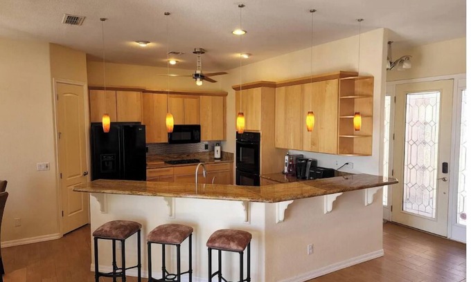 Sunridge Estates House | Custom 4 bdrm with Granny Suite and Infinity Pool