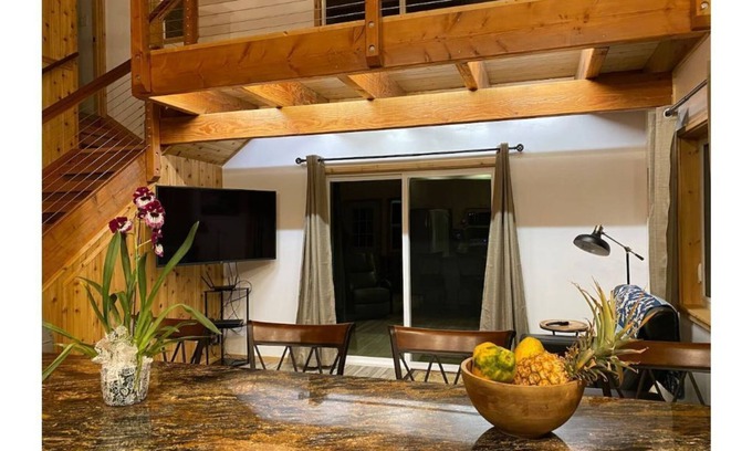 Honokaa Cottage | Custom cottage feels bright & airy yet cozy and private in this country setting.