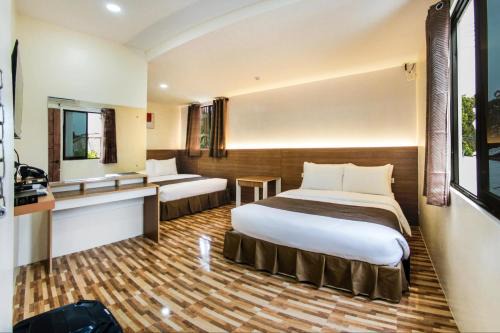 Plaridel Hotel | D&M Travellers Inn