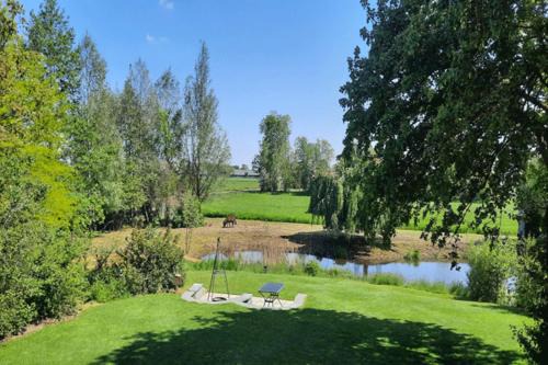 Municipality of Steenwijkerland House | De Opkikker 10 persoons vakantiehuis met hottub