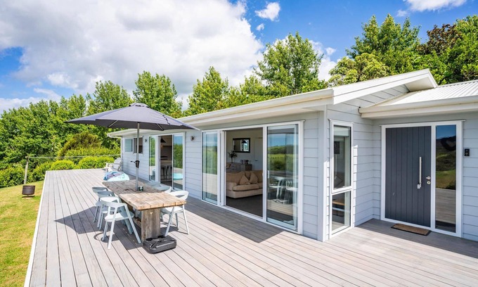 Mangawhai House | Divinity Olives - Large, stylish, sunny holiday home in a beautiful rural setting