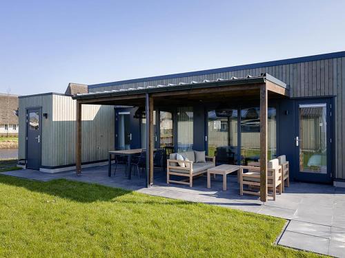 Delfstrahuizen House | Docklodge at Frisian Lakes with Private Mooring