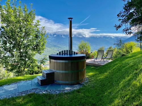 Granges Ski Chalet | Eco Lodge with Jacuzzi and View in the Swiss Alps