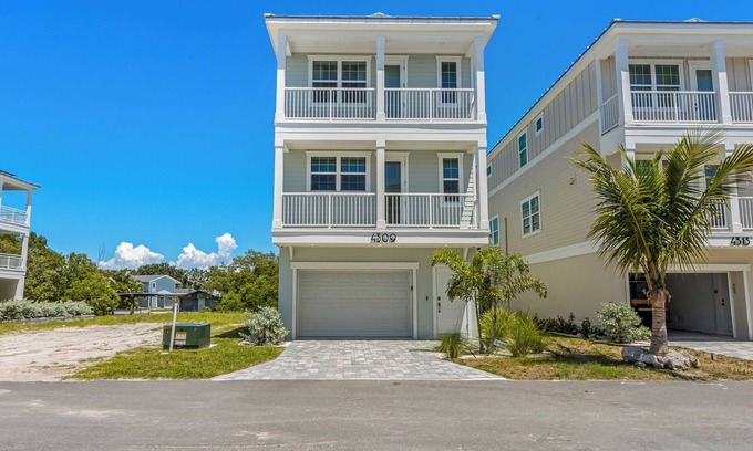 Cortez House | Eco-Luxe Canal Home w/Dock and EV Charger!