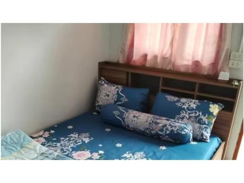 Rayong Apartment | Economy double room with fan only and external bathroom facilities