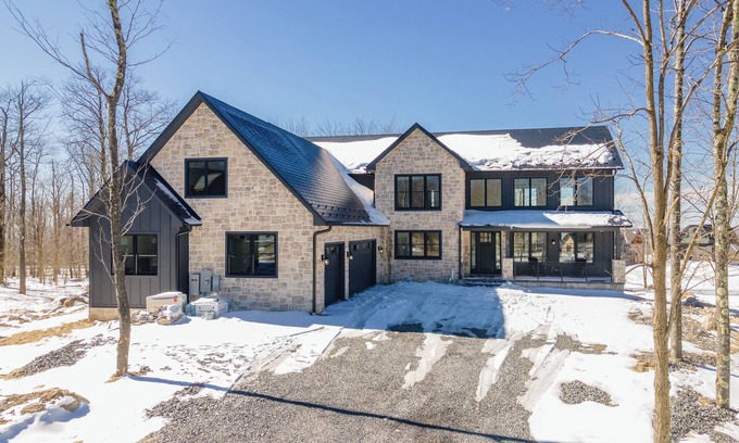 McHenry House | Elegant Luxury Lodge w/Views, Hot Tub & Games