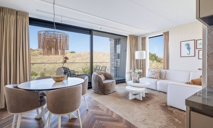 Sint Maartenszee Apartment | Endless enjoyment of luxury and atmosphere with a balcony and dune views