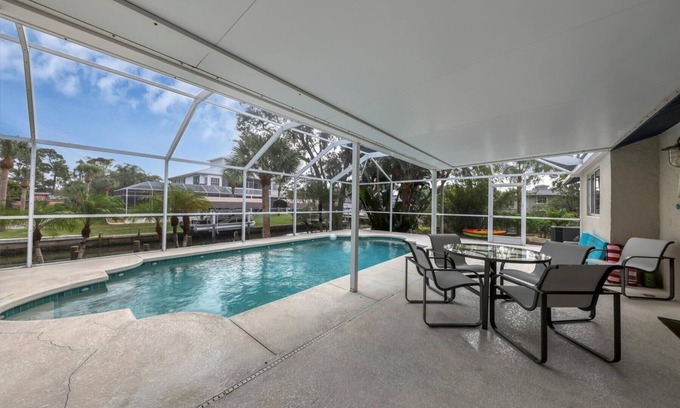 Grove City House | Englewood 2 Bedroom Canalfront Pool Cottage