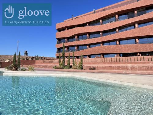 Guadalupe Apartment | Estudio de diseño con piscina by Gloove