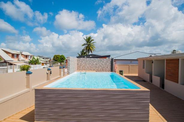 Port-Louis Apartment | Evasion en plein cœur de la ville T3 Jacuzzis Sauna et piscine au centre de Port-Louis