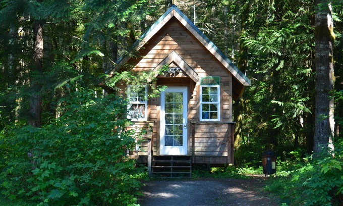 Ashford Cabin | Experience a custom built tiny home cabin near Mt Rainier National Park. It sleeps up to three! Firepit, access to shared hot tub, walking distance to Copper Creek Restaurant