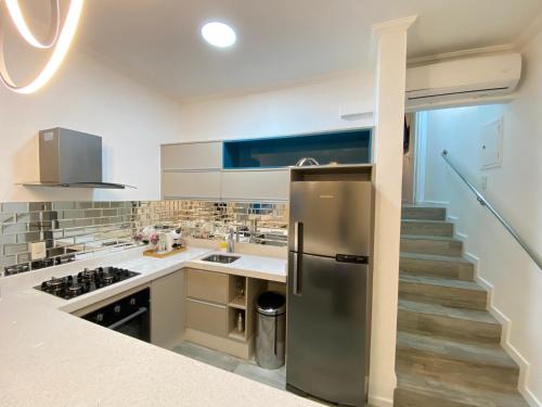 Riviera de Sao Lourenco Apartment | Fabuloso flat 241, Amarílis, Riviera de São Lourenço 3 Piscinas climatizadas carregador veiculo eletrico 2 quartos sendo uma suíte internet 500mb Adega, cozinha equipada completa, serviço de praia fim de semana limpeza trocas de toalhas,