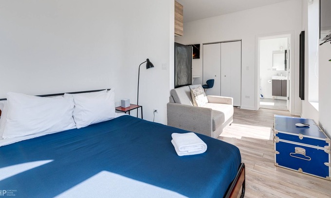 River West Apartment | Feel Comfy And Cozy At This Lovely Chi-town Home Away From Home - 747 Lofts Cabin 308 by RedAwning