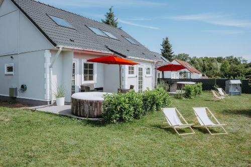 Luetow House | Ferienhäuser Insel Usedom Haus Mila 6 - Blick aufs Achterwasser! Whirlpool und Sauna