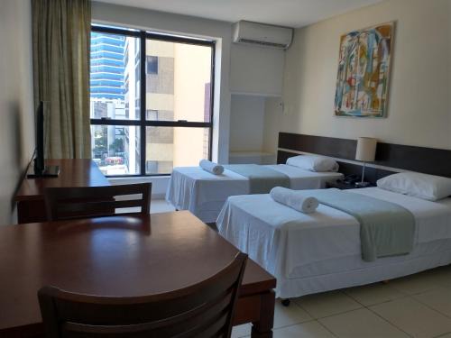 Caminho das Arvores Hotel | Flat Athenas 611