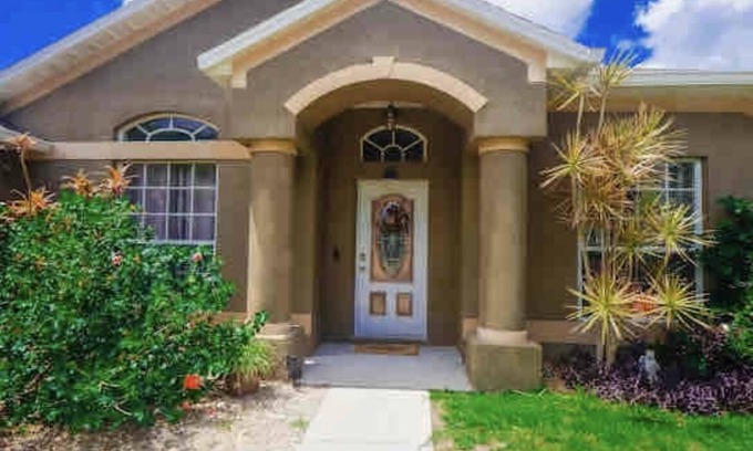 Port Saint John House | Fun for families, lots of room, private backyard oasis with heated pool.