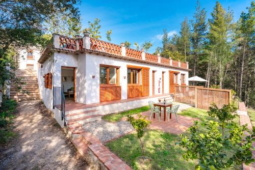 Can Ginebre Apartment | Ginkgo - Familienfreundliches Appartment in Katalanischer Masia