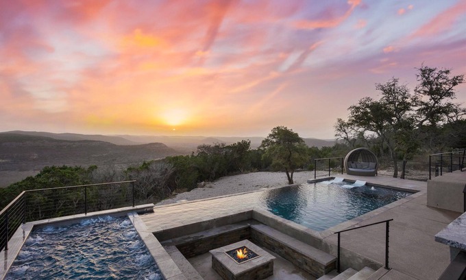 Concan House | Glam Luxury Home by Frio River! Heated Infinity Pool Firepit Huge Hot Tub Views