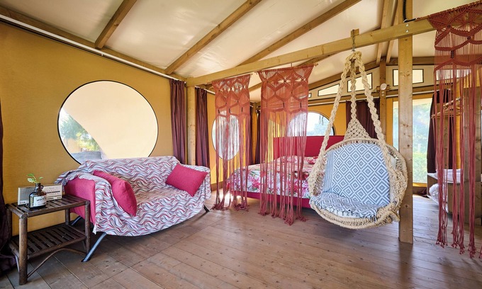 Piombino RV Rental | Glamping 'Tenda Glamping Vicino Al Mare' with Terrace, Garden and Wi-Fi