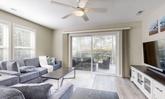 St. James Condo | Golf course view home with patio, close to ocean and beach access