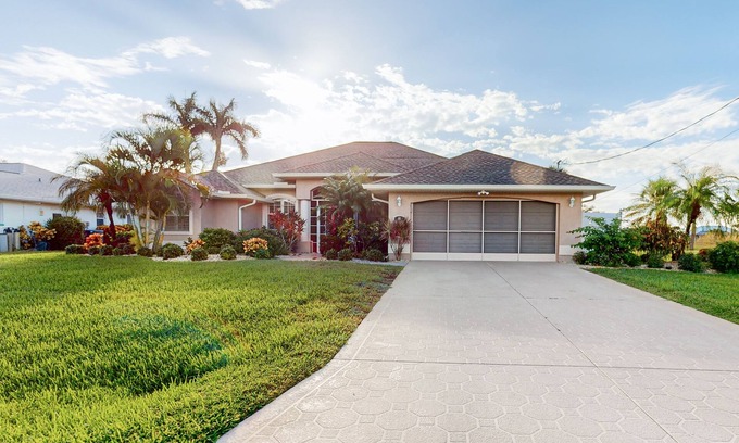 Long Meadow House | Golf course-view retreat with a private, heated pool, lanai, AC, & washer/dryer