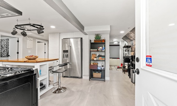 Tukwila Apartment | Gorgeous basement apt. w/chef kitchen, SPA bath, movie theater, hot tub & sauna