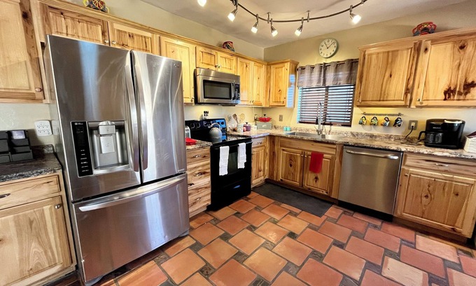 Peter Howell House | Gorgeous pool and spa, Beautiful home, Plenty of space- 10 minutes to U of A!