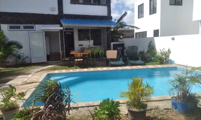 Pointe aux Biches Apartment | Groundfloor apartment, air-conditioned room with swimming pool close to the sea.