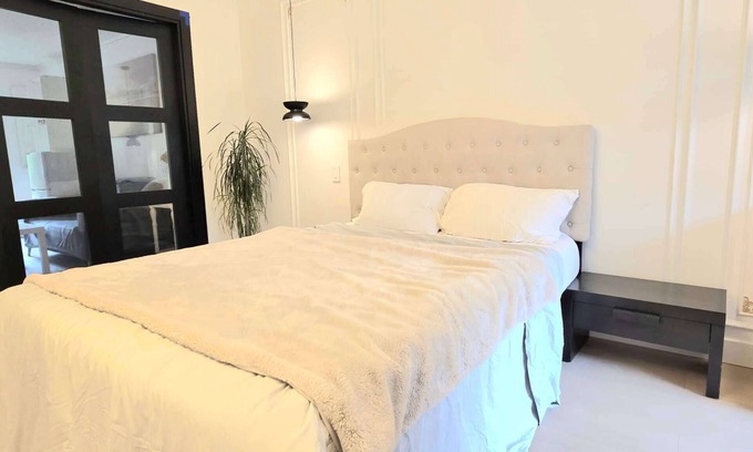 Steveston House | Guest Suite Studio One bedroom Large bathroom living room fenced yard Privacy