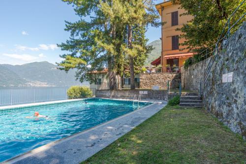 Nesso Apartment | GuestHost - Flat x4 in residence with swimming pool!