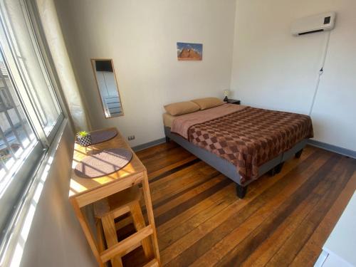 Santiago House | Habitación 3 con baño compartido en Providencia CASA ROMÁN