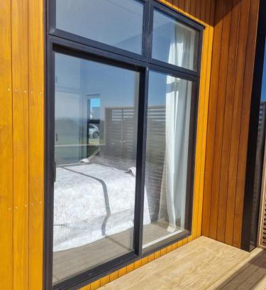Clarks Beach Apartment | Harbour and rural views