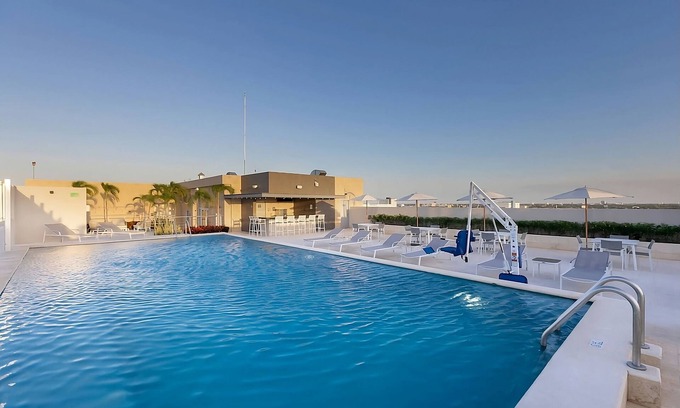 Zona Industrial House | Haven of Relaxation! Free Breakfast and Parking, Outdoor Pool, Pets Allowed!