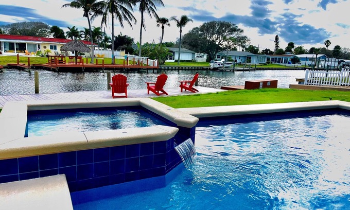 Cocoa Isles House | Heated Pool and Spa-3B/2B Waterfront on Canal close to the Beach