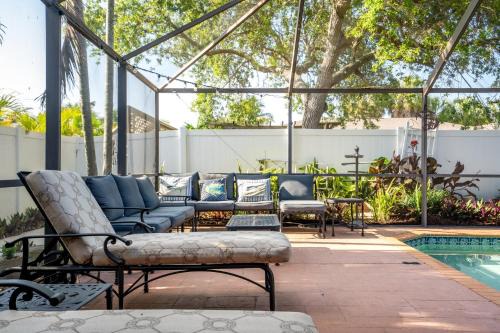 Palm River Estates House | HeatedPool, GameRoom, Pool Table & Darts, Fenced Yard