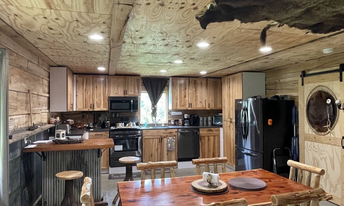 Turin Bed & Breakfast | Hill Top Cabin W/drive out snowmobiling and ATV riding.