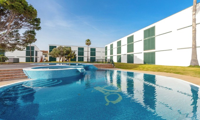 Son Xoriguer House | Holiday Home 'Cala´n Bosch 1a Planta' with Shared Pool, Shared Garden and Air Conditioning