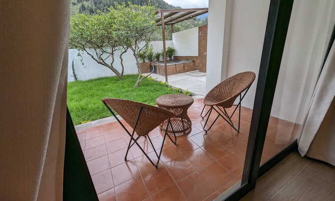 Banos de Agua Santa Villa | HolyBaños Cozy villa in Baños Ecuador. For families & friends w/hot tub