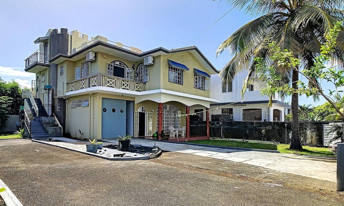 Calodyne Apartment | Homerez - Spacious apartment with garden and balcony