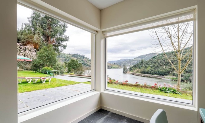 Resende House | HostWise – Riverside Retreat w/Infinity Pool
