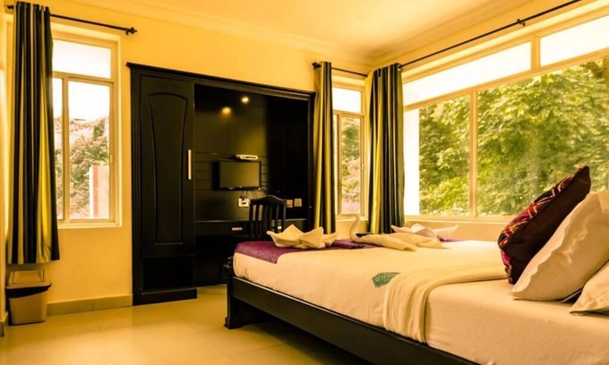 Munnar Hotel | HOTEL EMERALD INN