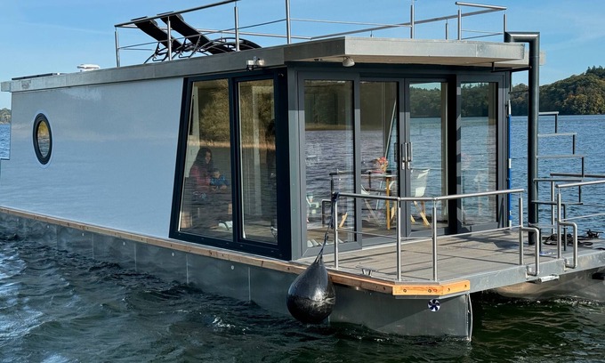 Dobin am See Boat Rental | House Boat 'Seahome' with Lake View, Private Terrace and Wi-Fi