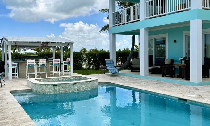 Treasure Cay House | House with Pool, Tiki Bar, and Dock/Boat Slip in Treasure Cay, Abaco