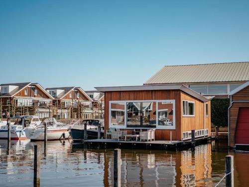 Municipality of Uitgeest House | Houseboat in Netherlands with Private Dock
