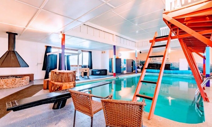 Junction City House | Indulge in the ultimate relaxation at our year-round private pool house.