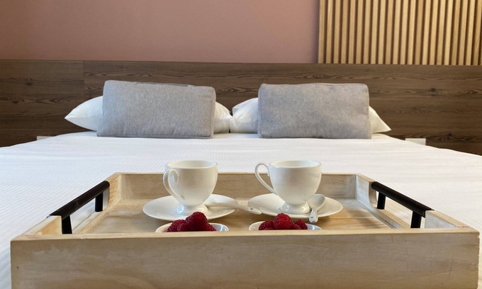 Pergine Valsugana House | Innesti Rooms & Apartments Green double bedroom with private bathroom