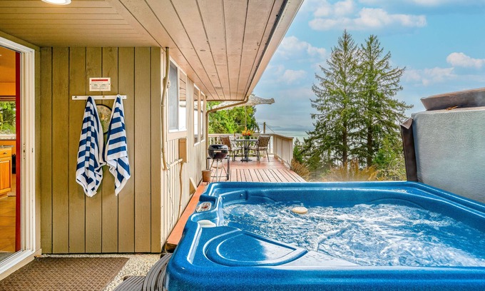 Neahkahnie Beach House | Inviting home with spectacular view, hot tub, balcony, fireplace, & W/D