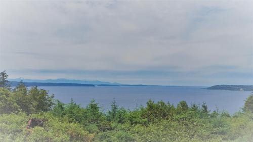 Three Tree Point House | Island View-Spectacular view of Puget Sound and the Olympic Mountains