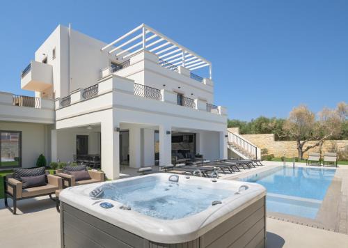 Perama Villa | Ivory Villa, Pool, Heated SpaWhirlpool, Sauna & Gym, By ThinkVilla